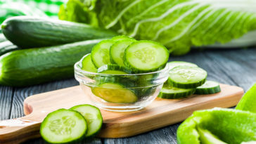 fresh cucumber sliced in a plate on table