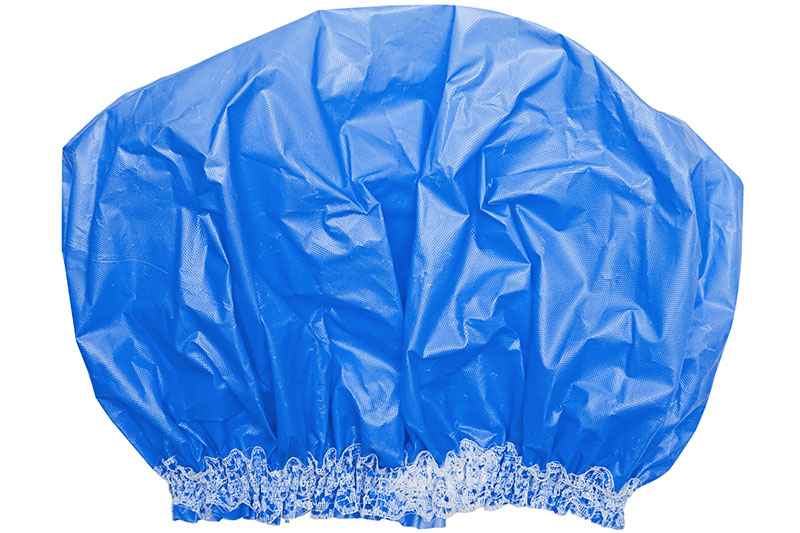 While Packing Shoes In A Suitcase, Use A Shower Cap